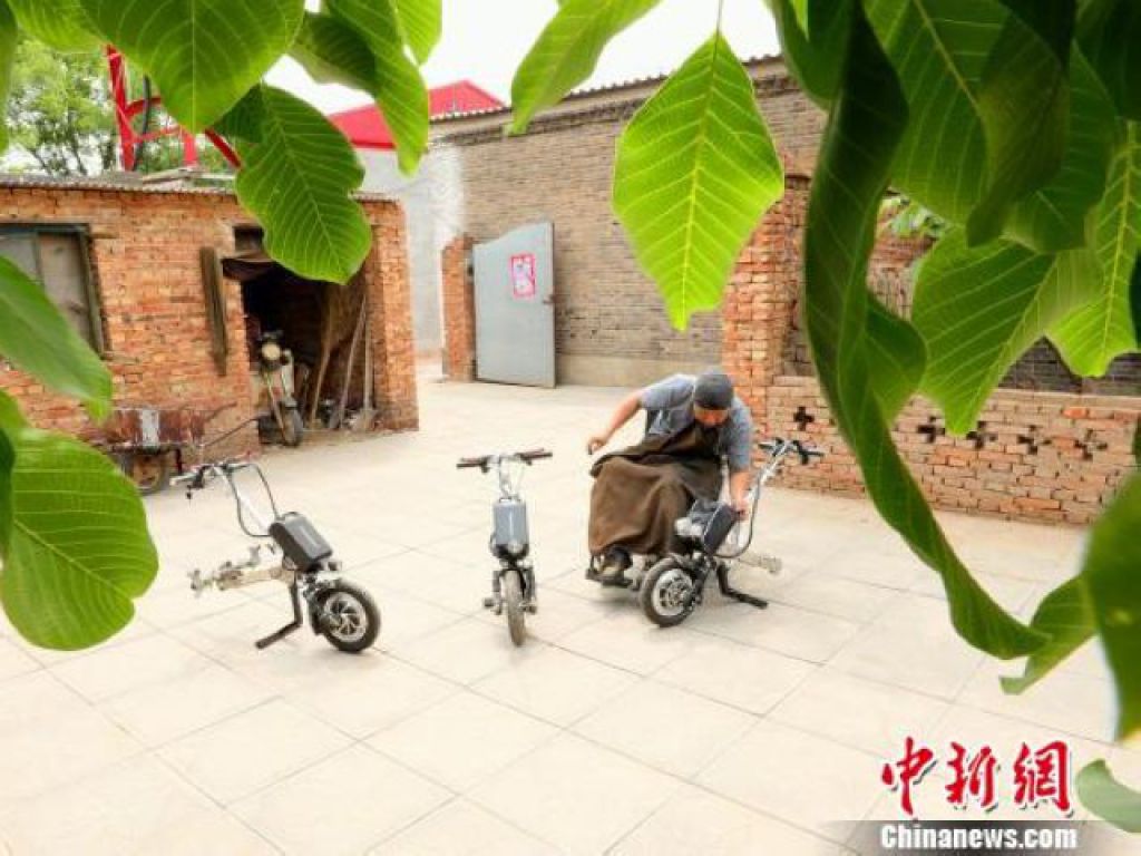 闫西博和他发明的轮椅车头