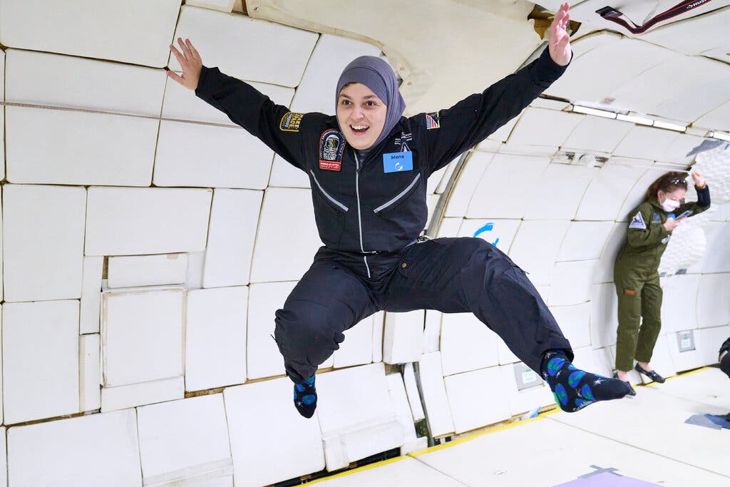 Mona Minkara, who is blind, in zero gravity. She tested an ultrasonic device and a haptic, or vibrat